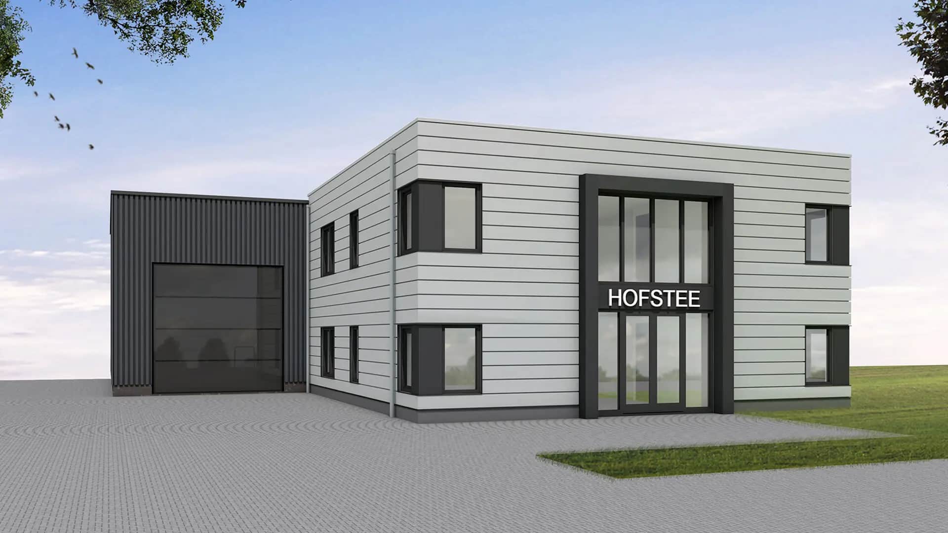 Moderne bedrijfspand Wolvega met grijze gevelafwerking, grote raampartijen, zwarte garage en ingangspartij met "HOFSTEE" opschrift